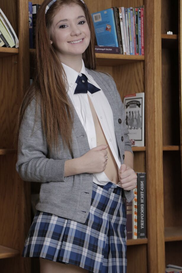 21P Brunette schoolgirl Ava Sparxxx hikes her skirt up and rides a dong in POV