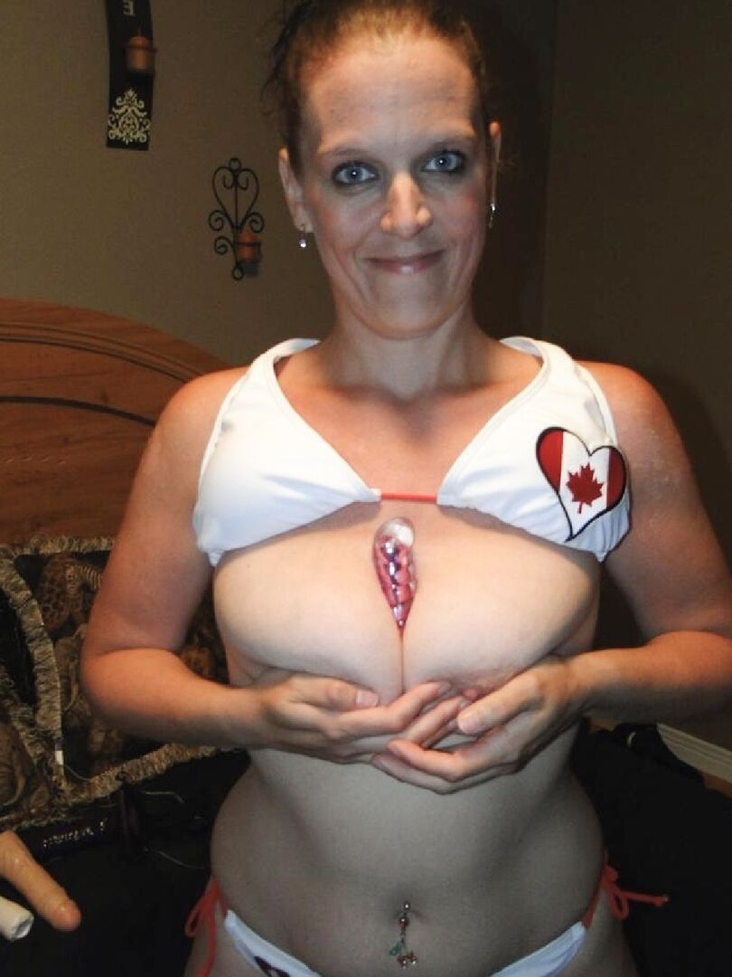 16P Mature woman Tiffany Lynne dons a strapon after inserting a butt plug