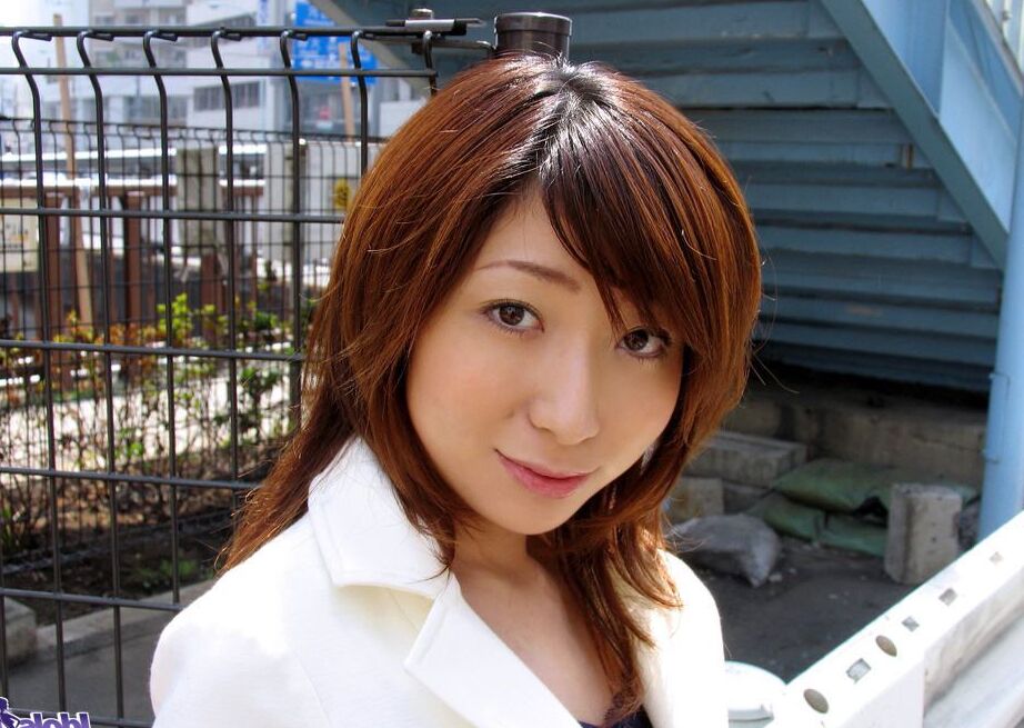 15P Young Japanese redhead Sayuri ends up completely naked on top of her bed