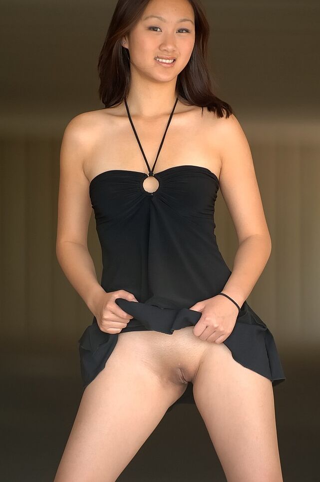 20P Shy Asian babe Tia screwing her innocent pussy with a red toy in public