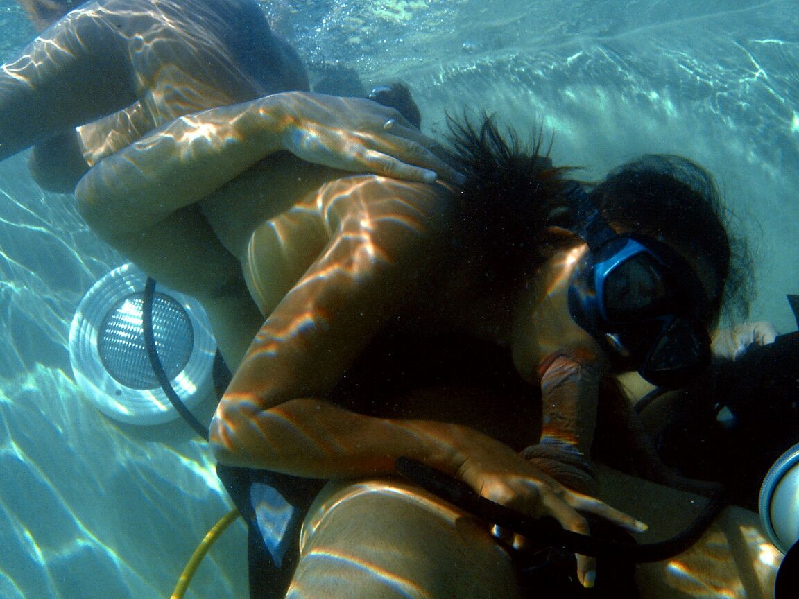 16P Asian scuba diver gives a BJ underwater before fucking beside pool