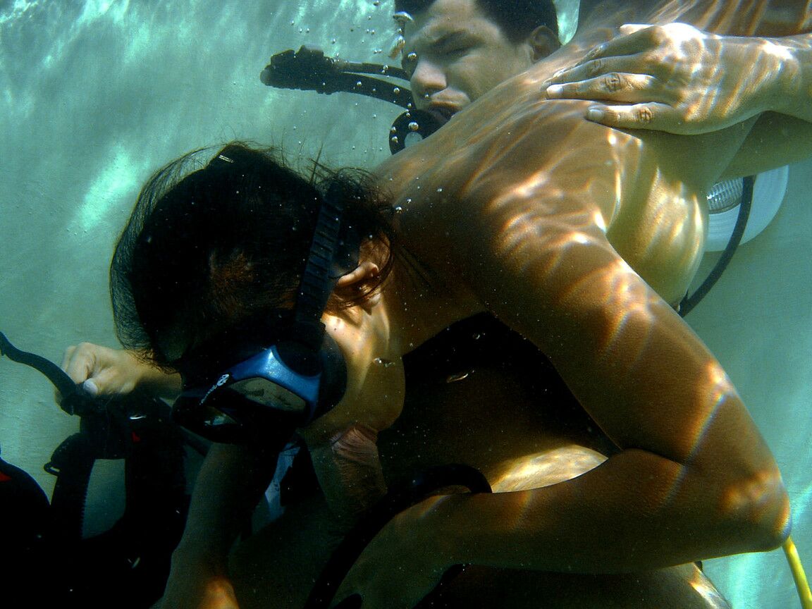 16P Asian scuba diver gives a BJ underwater before fucking beside pool