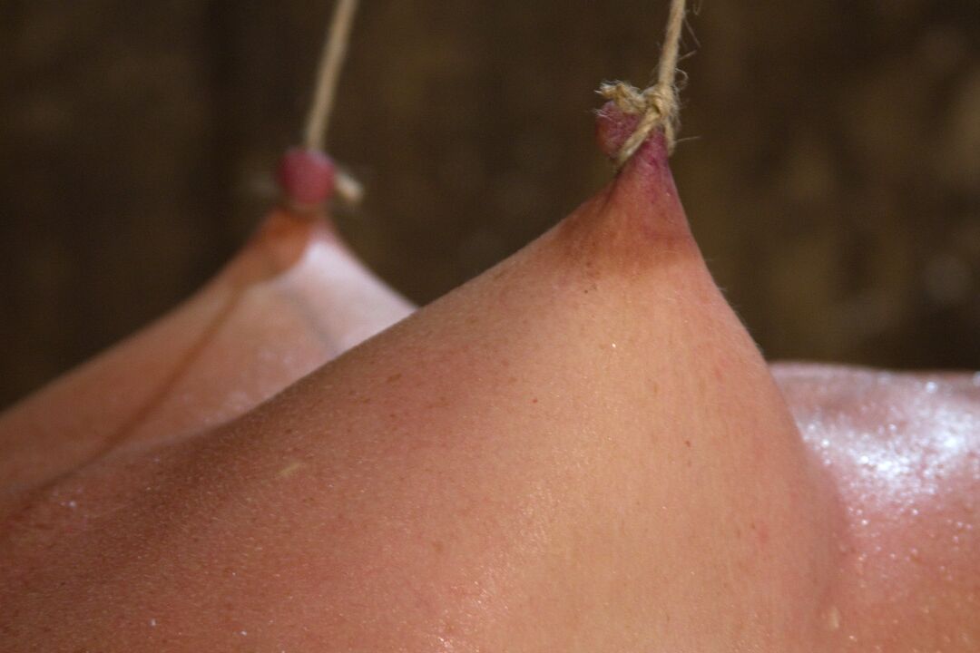 21P Submissive babe Wenona gets her hard nipples stretched while tied up