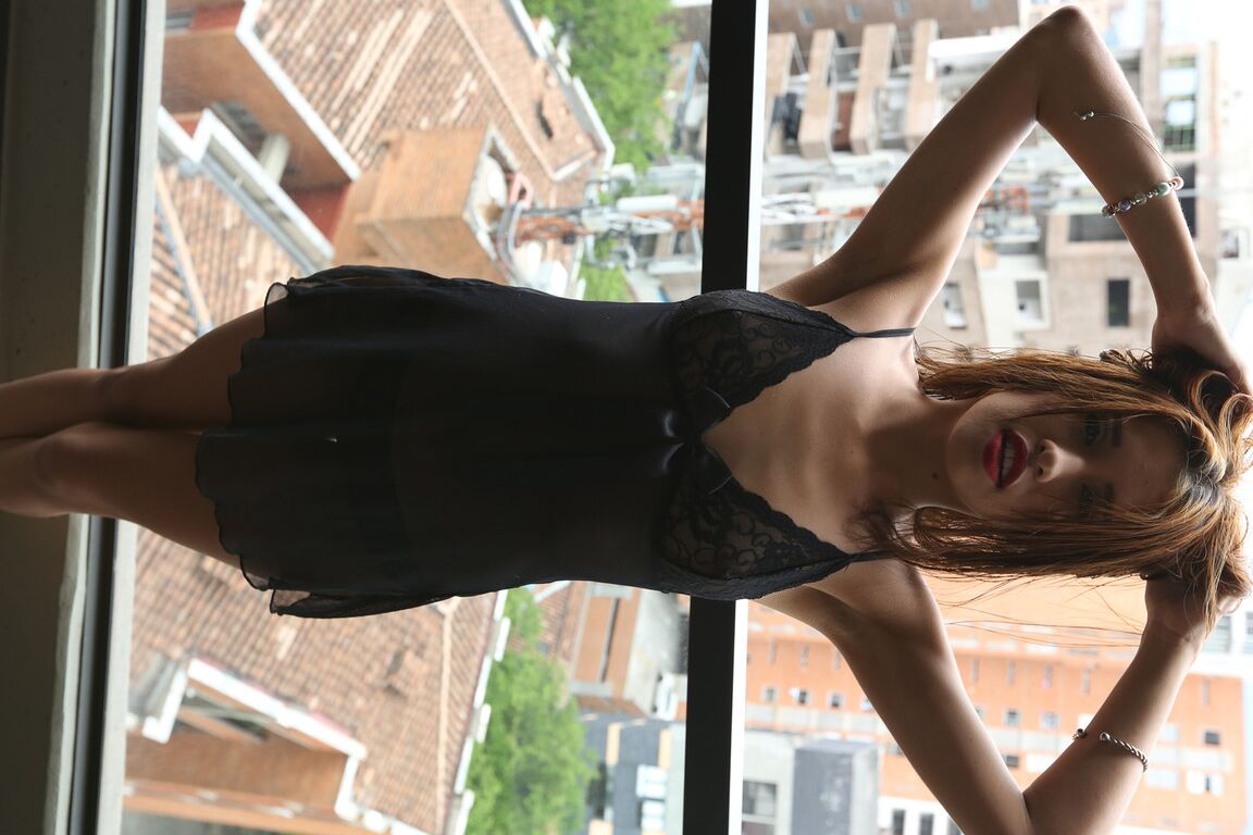 19P Brunette Colombian Laura Brown teases with her big bottom and tiny tits