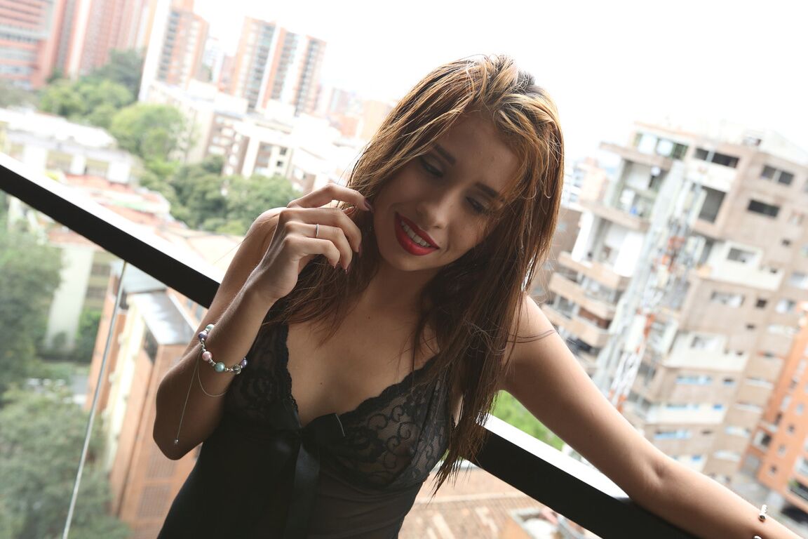 19P Brunette Colombian Laura Brown teases with her big bottom and tiny tits