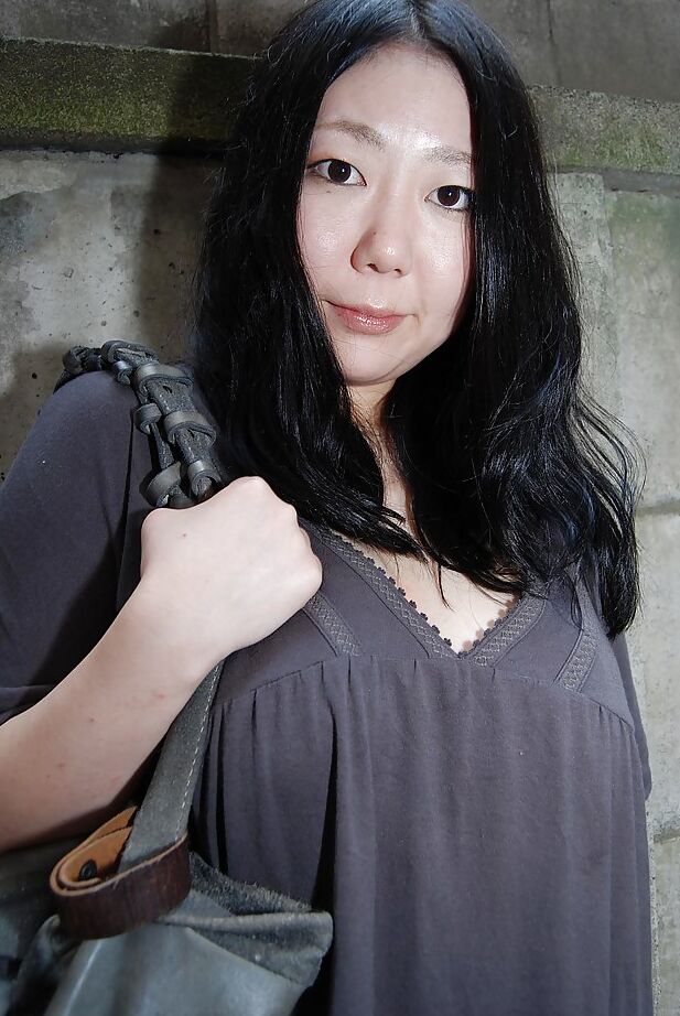 16P Well-stacked asian lassie undressing and exposing her juicy twat in close up