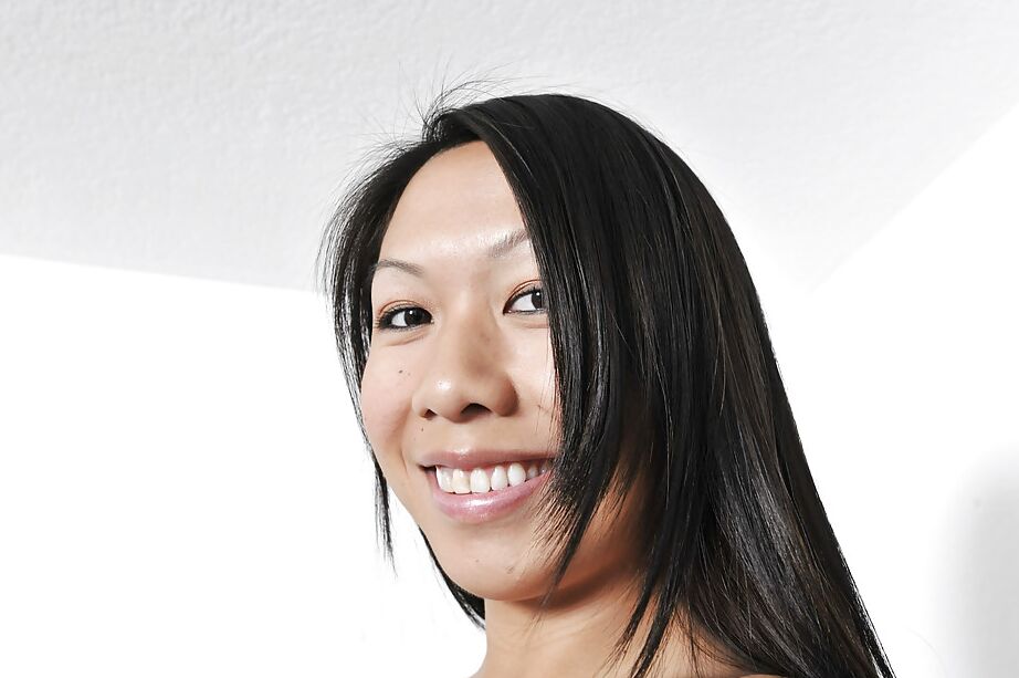 16P Asian first timer Celia drops denim shorts for nice view of shaved cunt