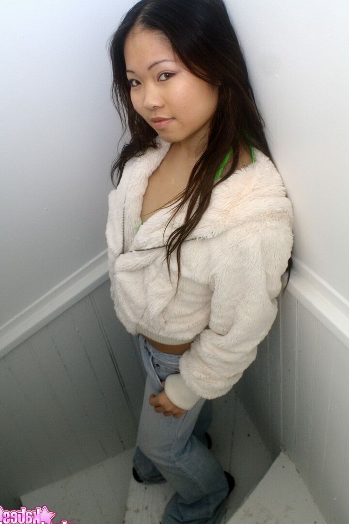 12P Asian first timer Grace removes her hooded coat to model in a bikini