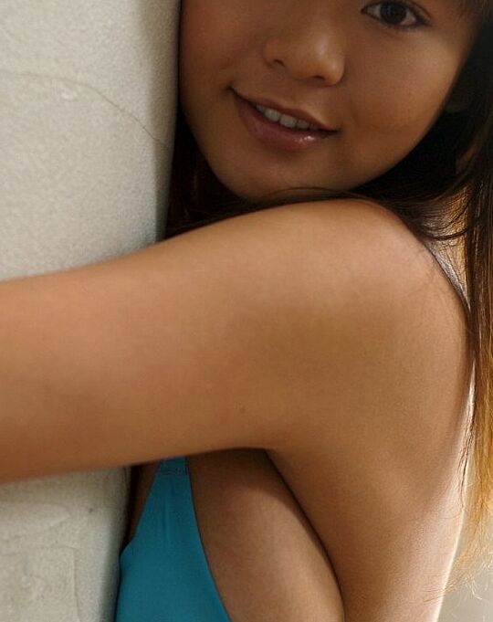 16P Japanese model Yoko Matsugane strikes great non nude poses in a bikini