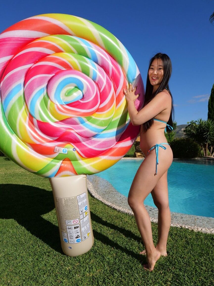12P This natural Japanese micro bikini model loves to model and when we showed her