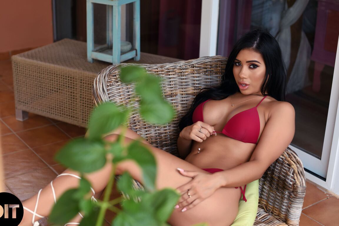 21P Asian with big juggs Nicole Snow shows her bosom after stripping her bikini