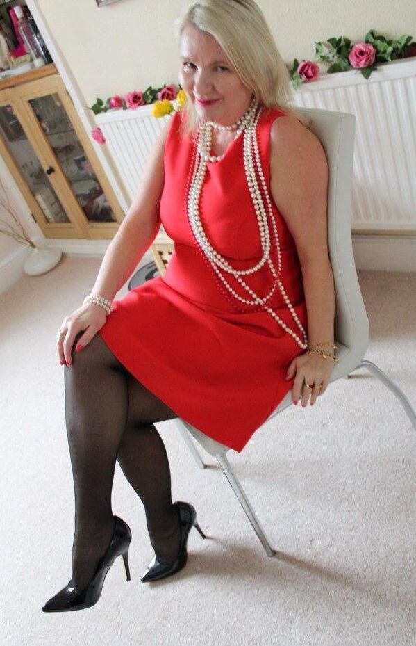 16P Older blonde is tied up, gagged and blindfolded in a few outfits
