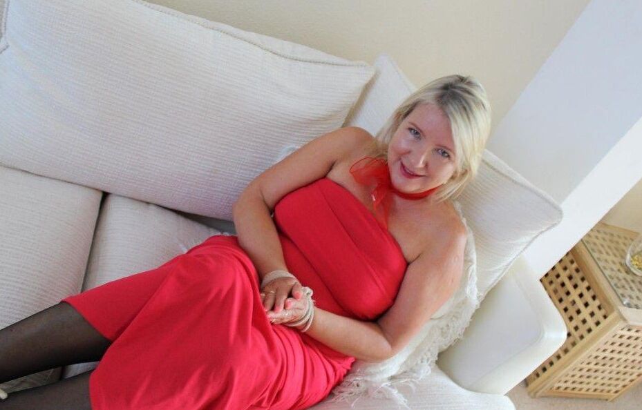 16P Older blonde is tied up, gagged and blindfolded in a few outfits