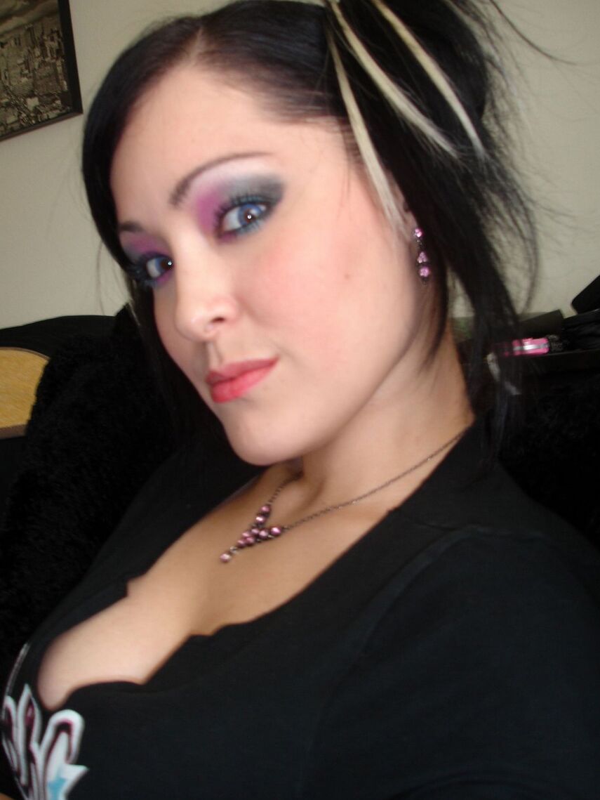 12P Kitty loves to tease the boys with her extremely lowcut shirt showing off her