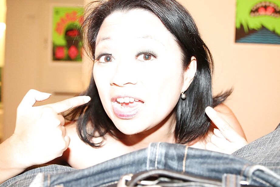 16P Salacious asian MILF strokes a large cumshot out of this hard dick
