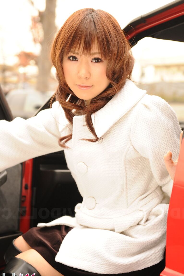 15P Japanese model Yuko Morita shows some leg while clothed in black boots