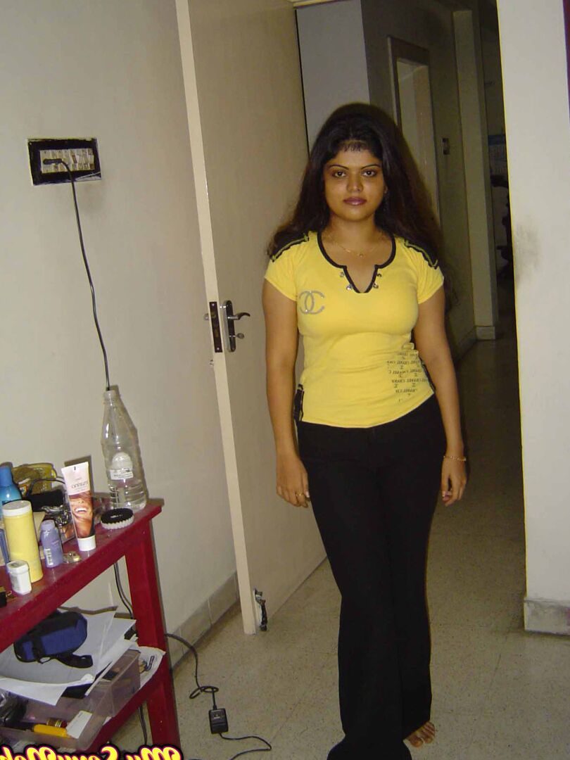 15P Indian girl Heha puts a smile on her pretty face during non nude poses