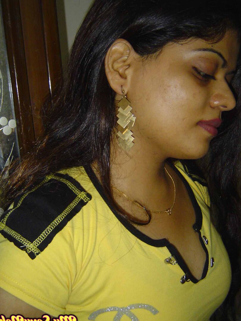 15P Indian girl Heha puts a smile on her pretty face during non nude poses