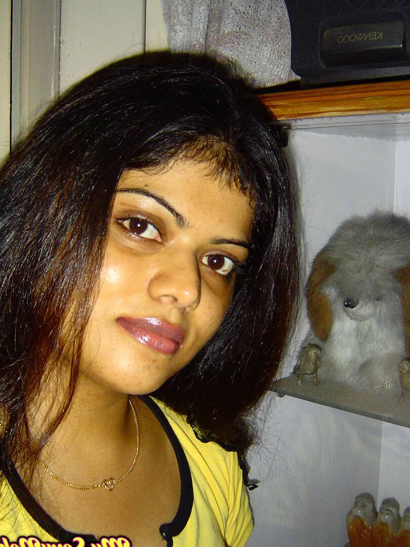 15P Indian girl Heha puts a smile on her pretty face during non nude poses