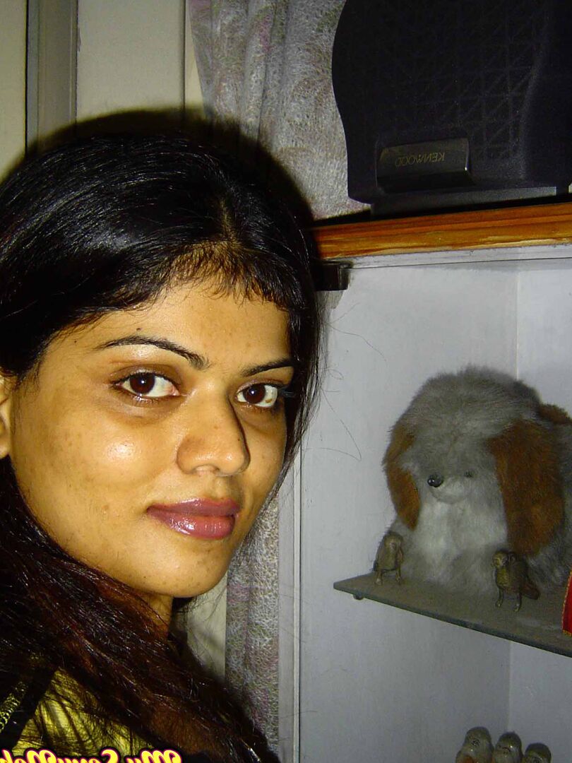 15P Indian girl Heha puts a smile on her pretty face during non nude poses