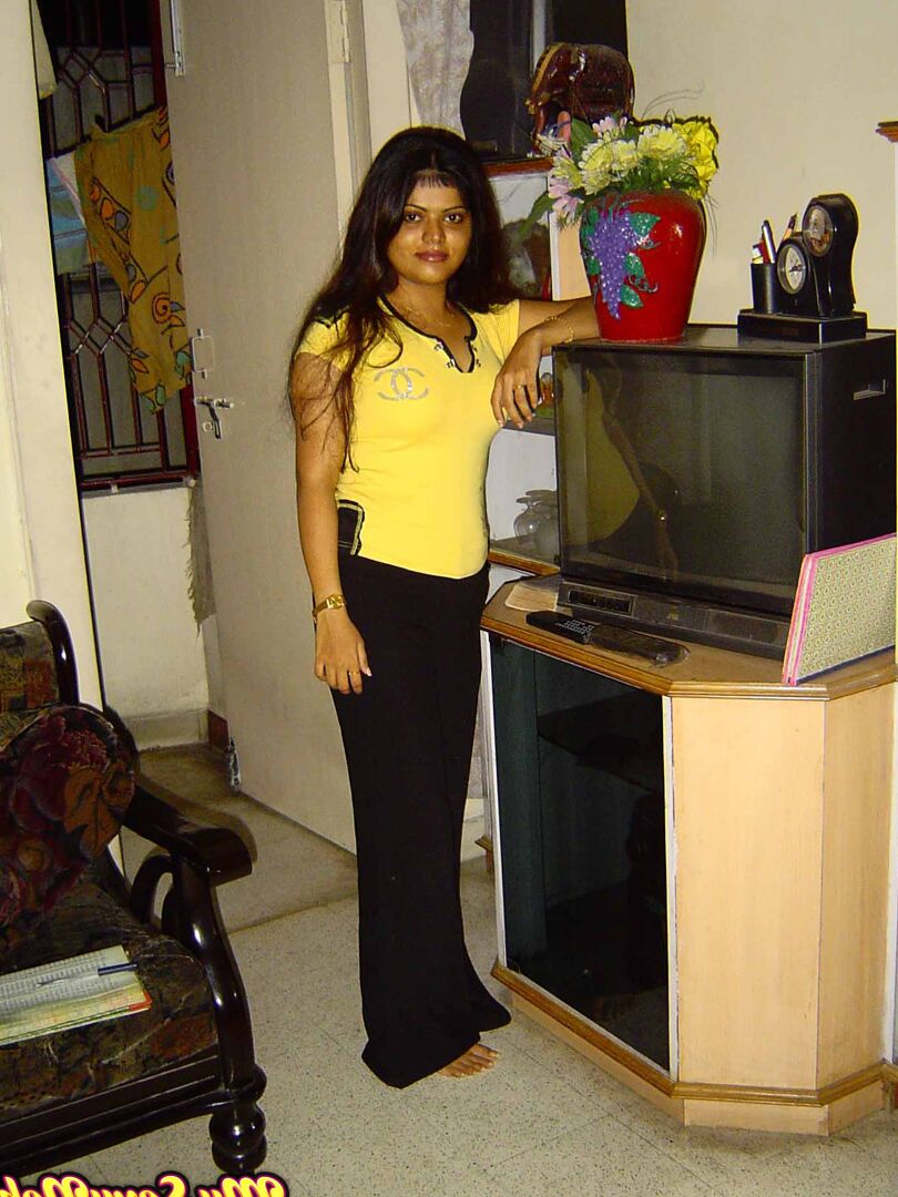 15P Indian girl Heha puts a smile on her pretty face during non nude poses