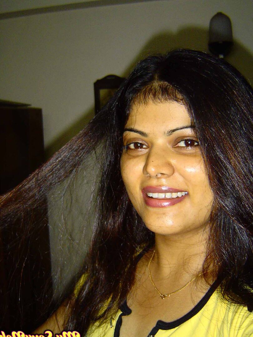 15P Indian girl Heha puts a smile on her pretty face during non nude poses