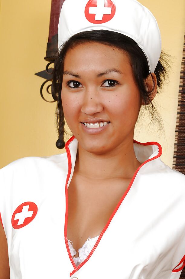 16P Asian first timer Julie masturbating shaved pussy in nurse's cap