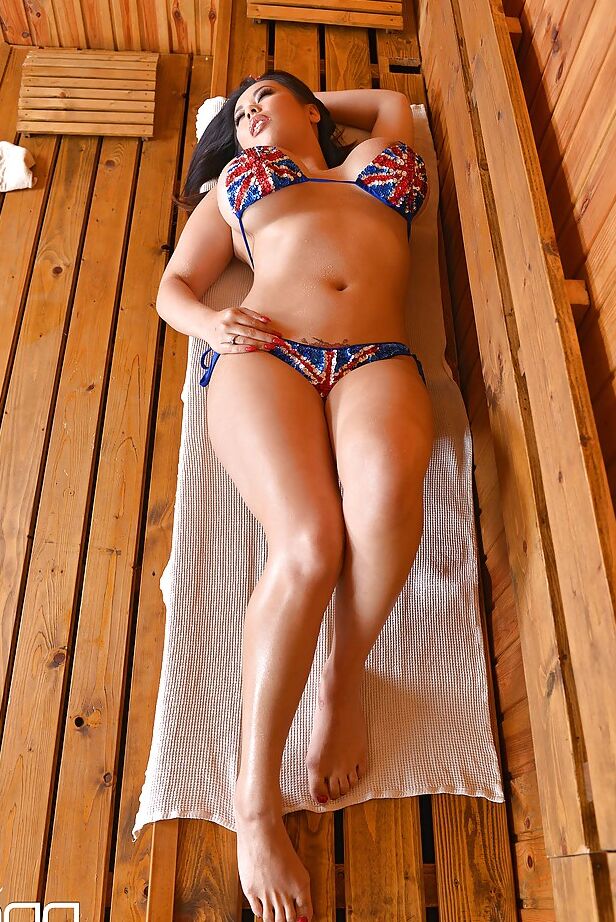 16P Buxom Asian model Tigerr Benson strutting non nude in bikini