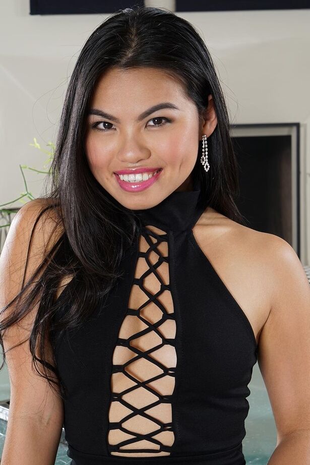 15P Sexy Asian chick Cindy Starfall undresses and inserts a butt plug in her ass