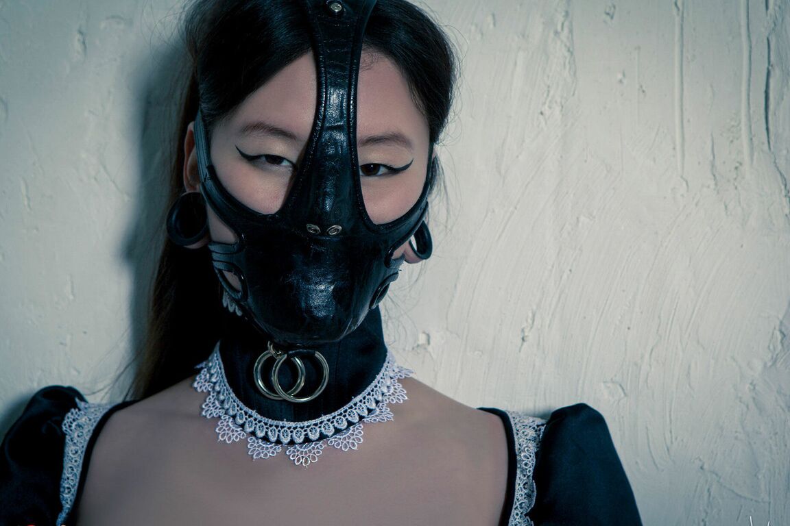16P Korean model poses for a solo shoot in a naughty rubber maid outfit