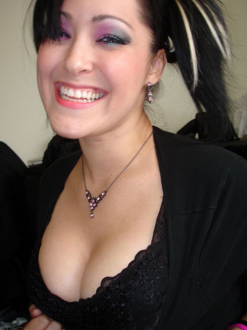 12P Watch as Kitty squeezes her huge round tits together