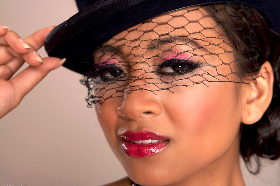16P Asian model Kina Kai dons a top hat to show her twat in black stockings