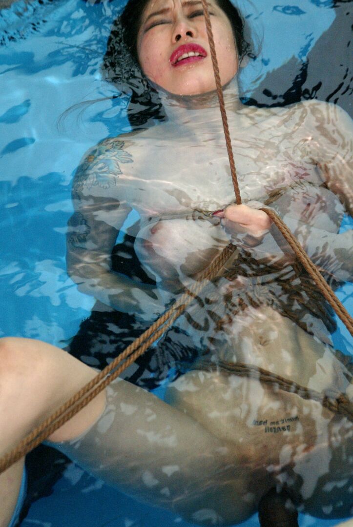 21P Sweet Asian sex slave June Mizuna gets toyed and abused in the pool