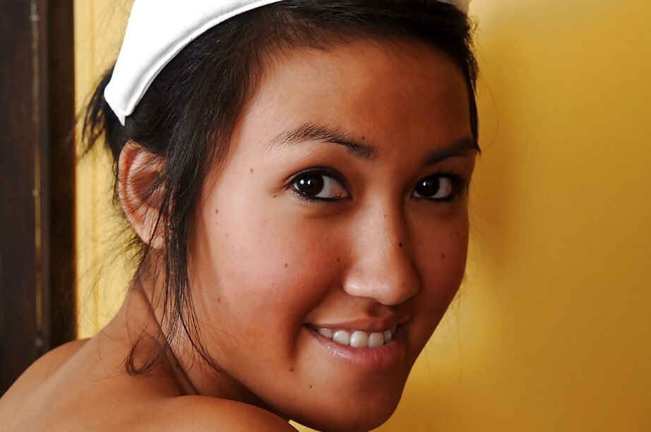 16P Petite Cambodian first timer Julie baring tiny tits and masturbating