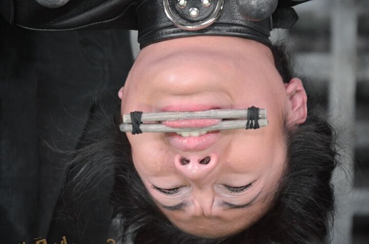 16P Asian chick Mia Li is suspended upside down while being made to suck cock