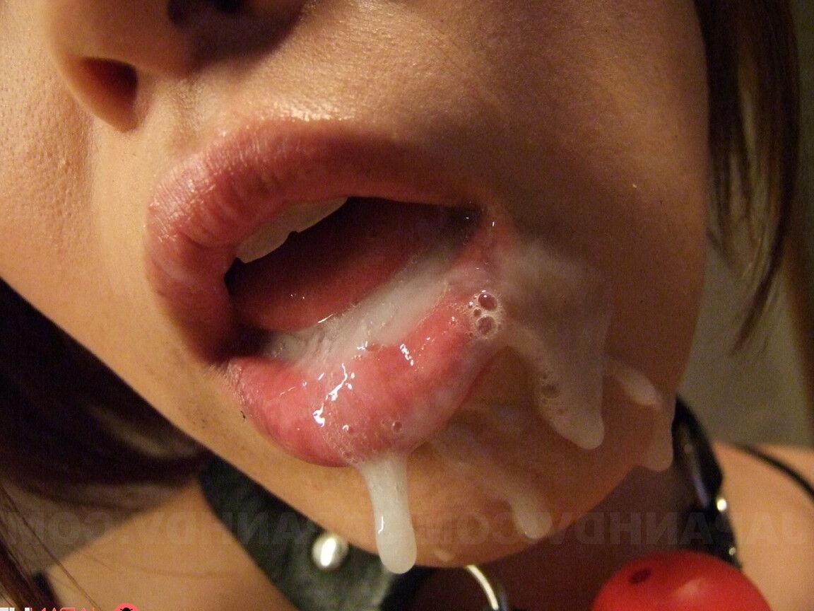 21P Asian babe Hiromi Tominaga eats a huge load of cum after a BDSM group toying