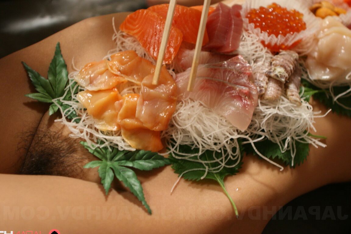 21P Sweet Asian babe Ramu Nagatsuki gets toyed while covered with sushi on a table