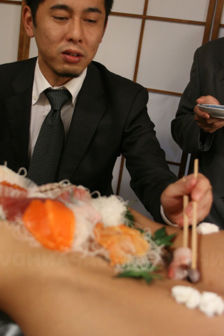 21P Sweet Asian babe Ramu Nagatsuki gets toyed while covered with sushi on a table