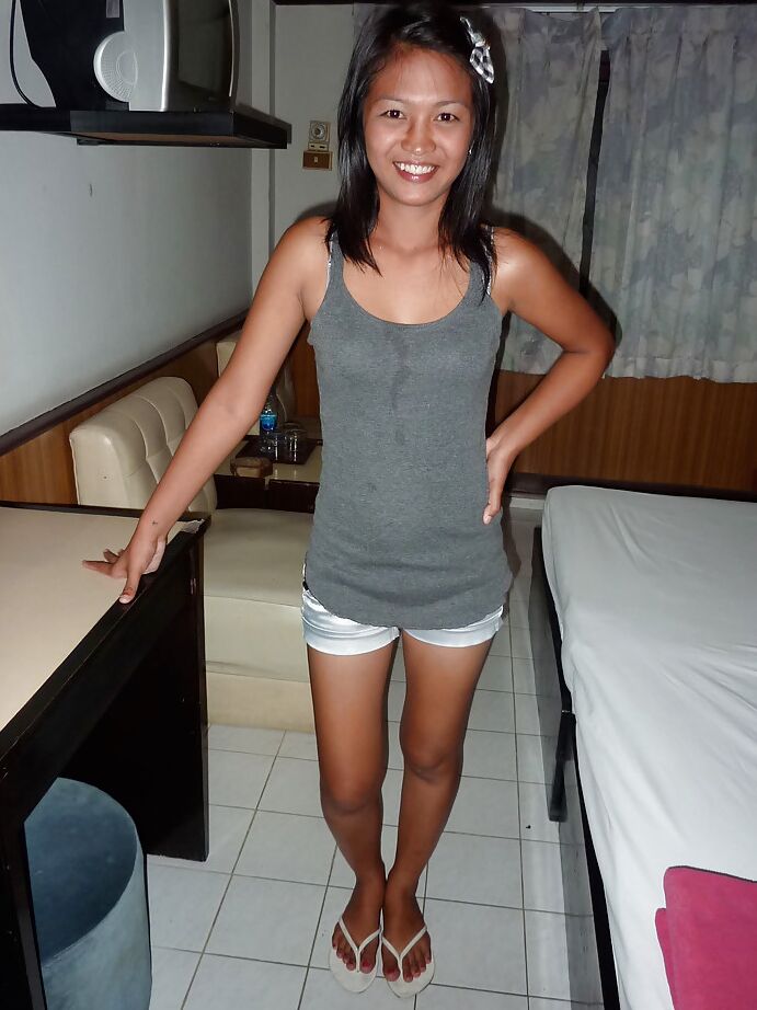 13P Thai solo girl Meow showing off tattooed twat and back before peeing in toilet