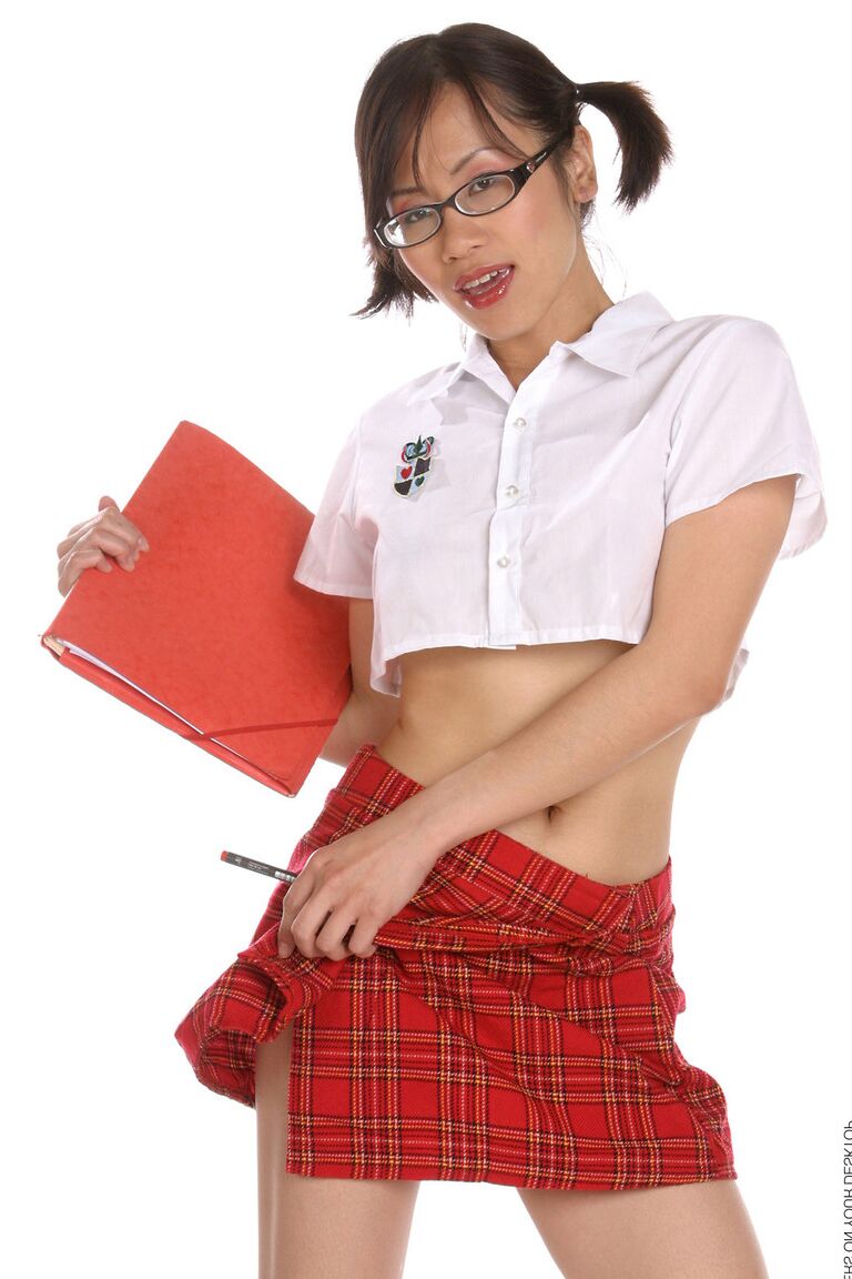 15P Asian student Ting exposes her small tits and tight slit in a teasing manner