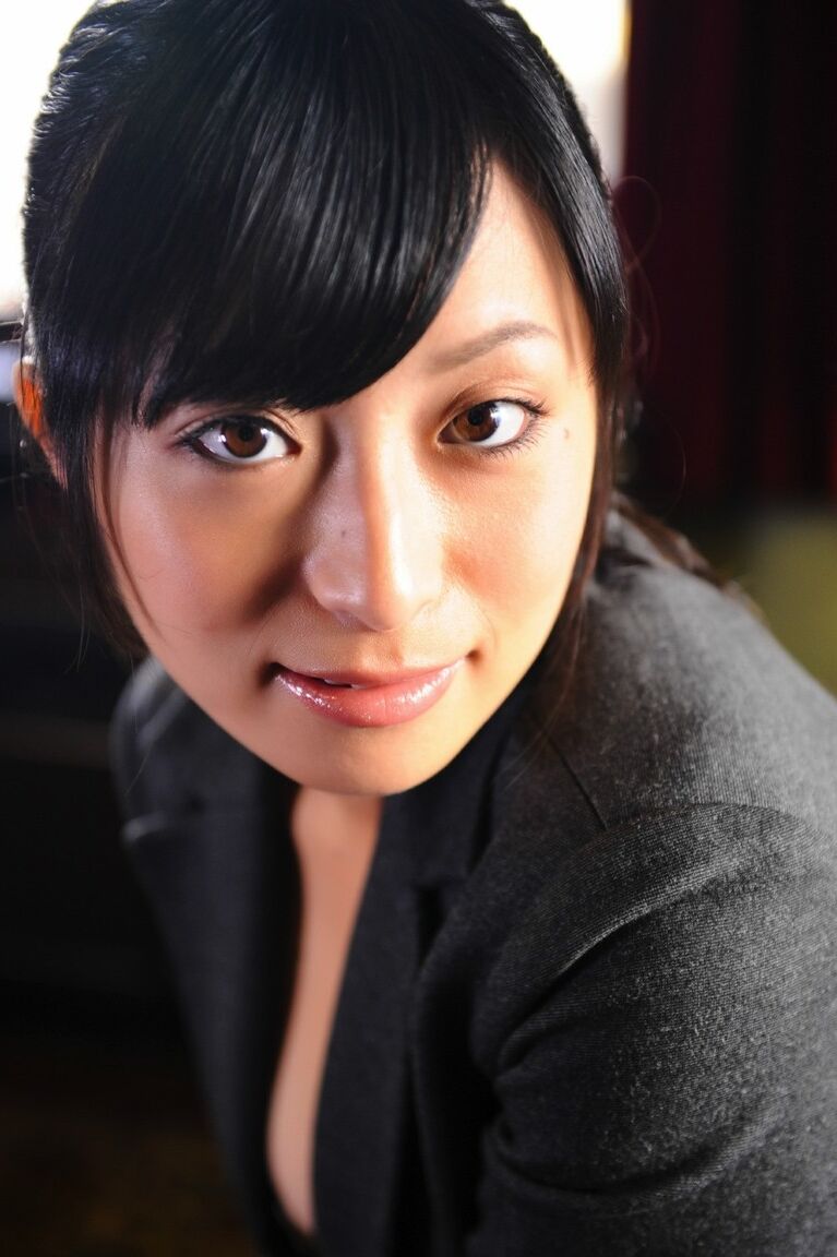 12P Fully clothed Japanese girl takes off her glasses and puts them back on again
