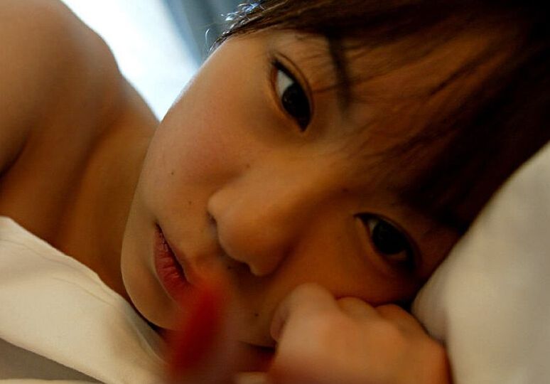 16P Japanese girl Kurumi Morishita displays her firm tits while getting changed
