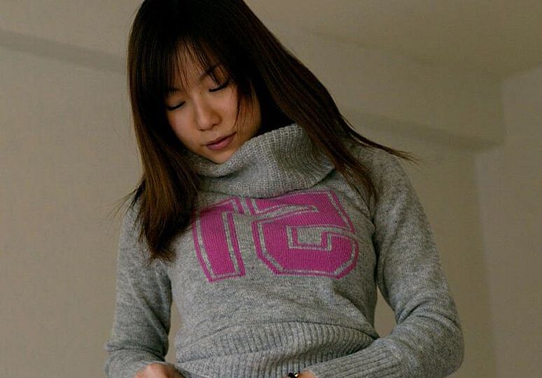16P Japanese girl Kurumi Morishita displays her firm tits while getting changed