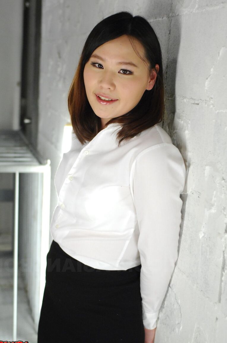15P Asian chick Aki Sasahara is fitted with gag in white blouse and black skirt