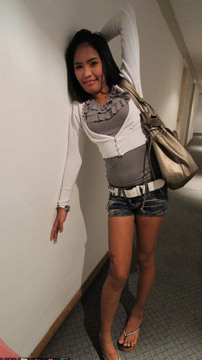 15P Petite Asian chick shows her snatch during closeups and while standing naked