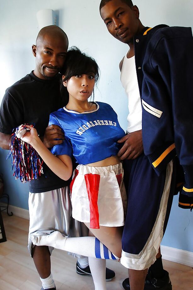 16P Awesome asian cheerleader May gets banged by these two black cocks