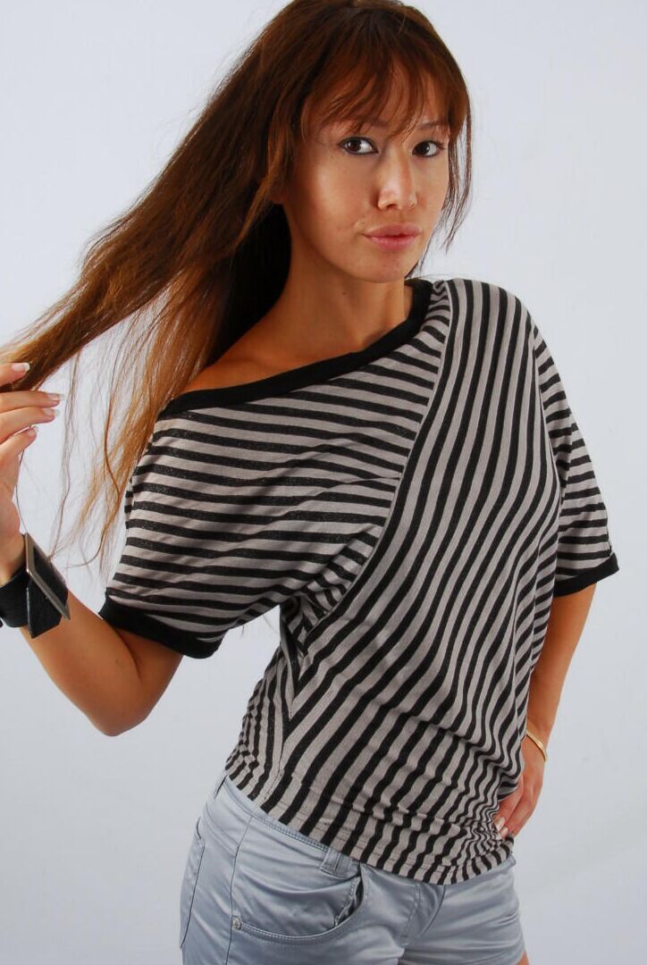 16P Asian redhead Evita glances at her huge Frilis watch while fully clothed