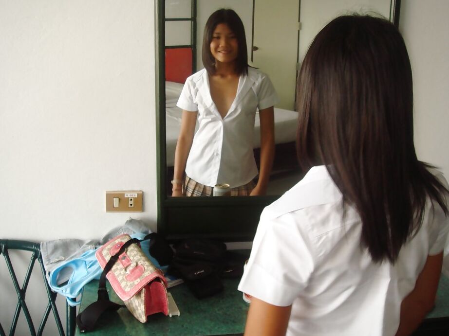 16P Clothed chick Apple is taking off her panties while looking in the mirror