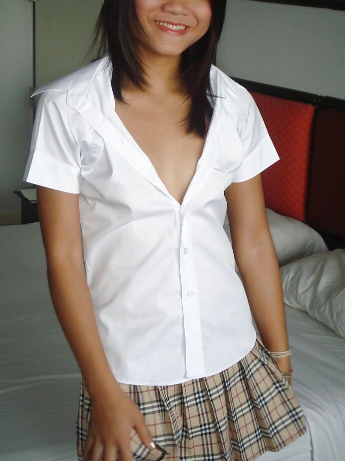 16P Clothed chick Apple is taking off her panties while looking in the mirror