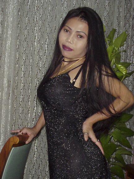 16P Filthy asian babe in leather dress stripping and playing with a huge toy